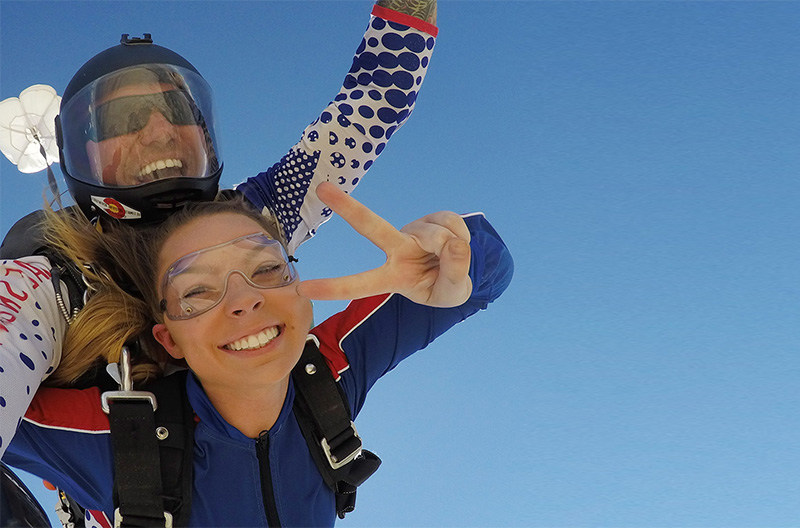 Skydiving Client with Instructor Jumping From Airplane in Colorado Flight School